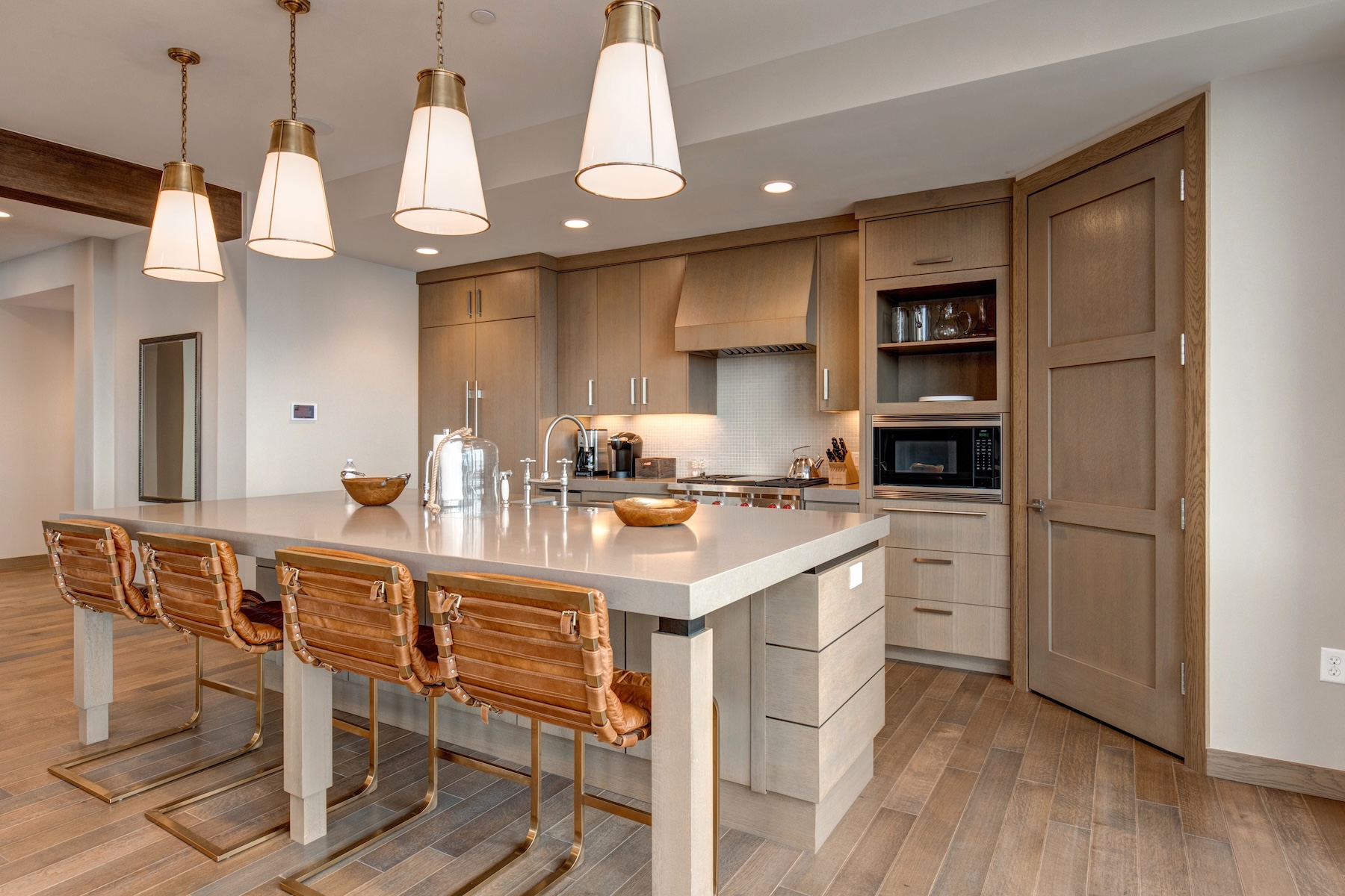 Spacious kitchen at our luxury Deer Valley vacation rental with high end finishes and appliances and views of Deer Valley