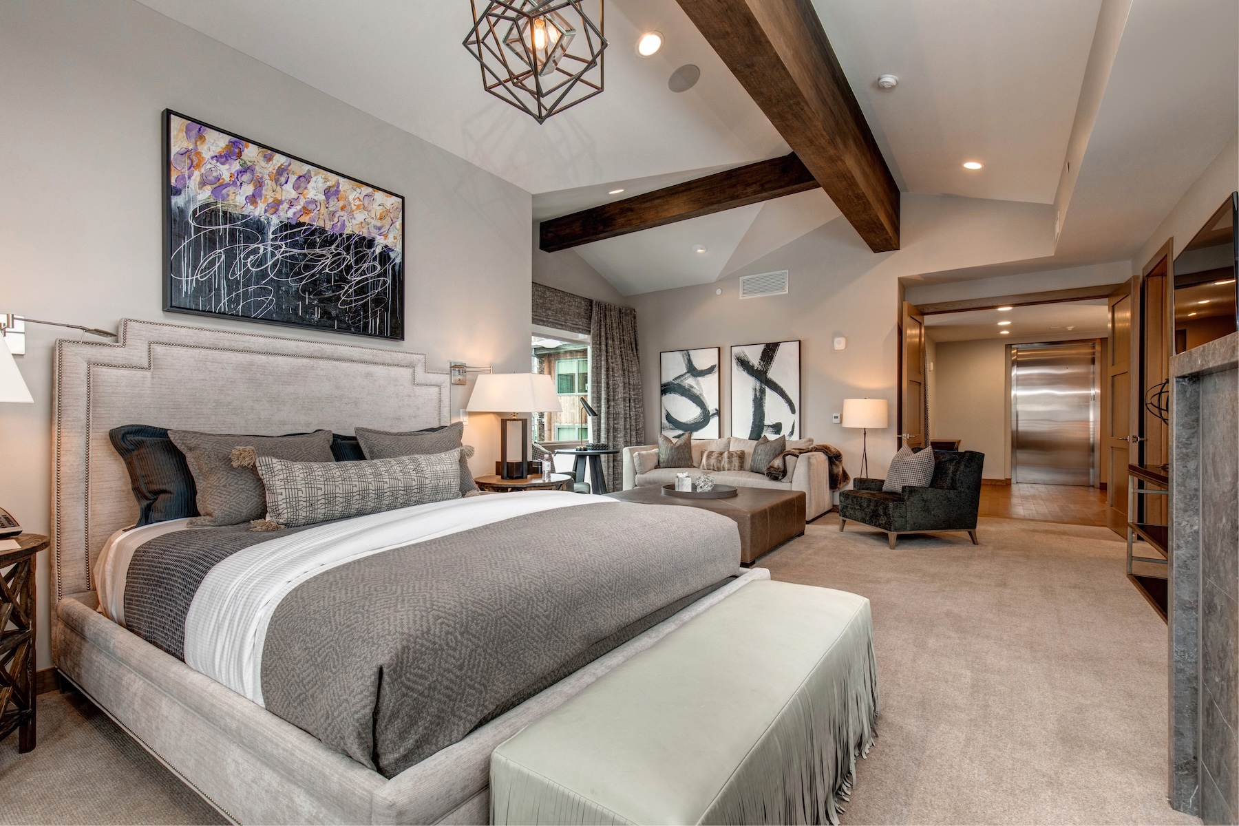 Modern, contemporary designed bedroom with private balcony at Stein Eriksen Residences Deer Valley vacation rental
